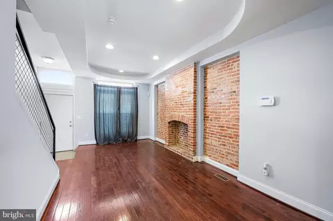 Living - 327 E 21st St, Baltimore, MD 21218 photo 1 of 1