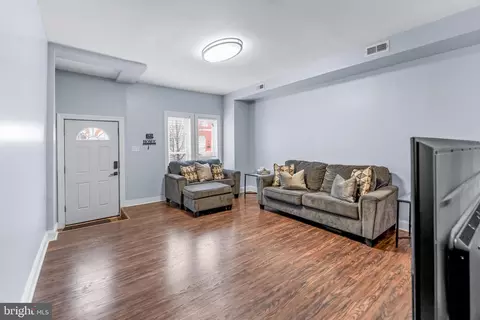 Living - 1713 E Lafayette Ave, Baltimore, MD 21213 photo 1 of 1
