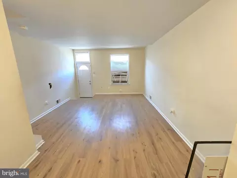 Living - 1207 E Lanvale St, Baltimore, MD 21202 photo 3 of 4