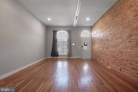 Living - 3109 E Baltimore St, Baltimore, MD 21224 photo 1 of 4