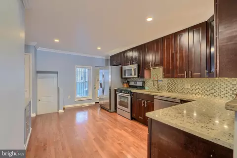 Kitchen - 104 N Luzerne Ave, Baltimore, MD 21224 photo 1 of 4