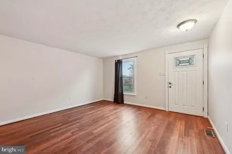 Living - 1113 Argyle Ave, Baltimore, MD 21201 photo 1 of 8