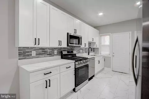 Kitchen - 3604 Greenmount Ave, Baltimore, MD 21218 photo 2 of 2