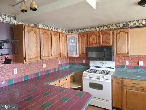 Kitchen - 3731 Elmley Ave, Baltimore, MD 21213 photo 2 of 2