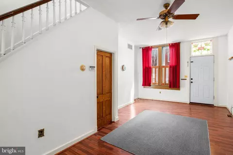 Living - 106 Scott St, Baltimore, MD 21201 photo 4 of 6