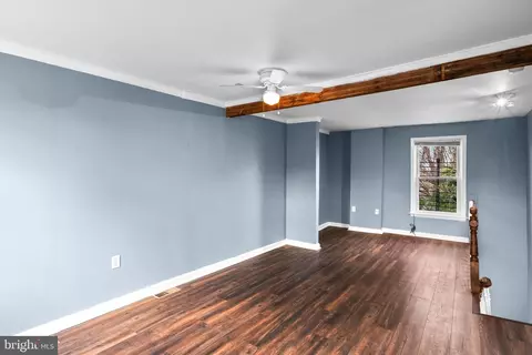 Living - 106 Scott St, Baltimore, MD 21201 photo 5 of 6