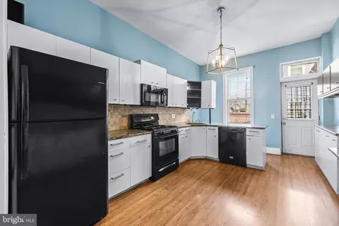 Kitchen - 2832 E Baltimore St, Baltimore, MD 21224 photo 1 of 2