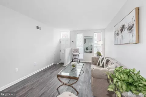 Living - 1127 N Stricker St, Baltimore, MD 21217 photo 1 of 2
