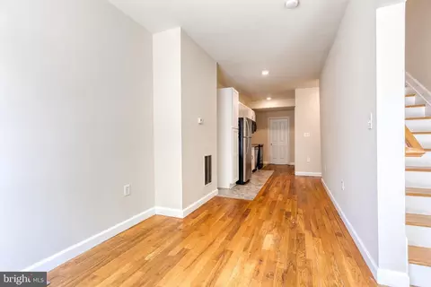 Living - 422 E Lanvale St, Baltimore, MD 21202 photo 1 of 6
