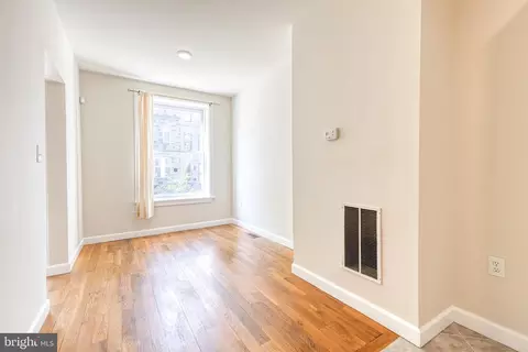 Living - 422 E Lanvale St, Baltimore, MD 21202 photo 2 of 6
