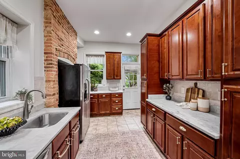 Kitchen - 2425 N Calvert St, Baltimore, MD 21218 photo 2 of 2