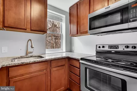 Kitchen - 210 W Read St, Baltimore, MD 21201 photo 2 of 2