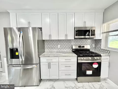 Kitchen - 1617 Pentwood Rd, Baltimore, MD 21239 photo 4 of 7