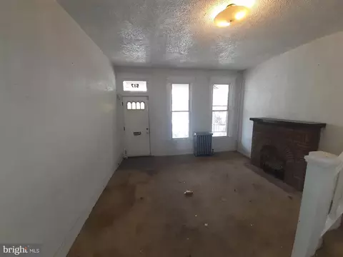 Living - 517 E 38th St, Baltimore, MD 21218 photo 2 of 4
