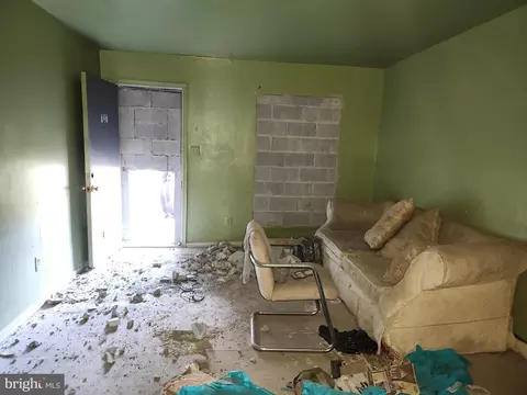 Living - 737 E 23rd St, Baltimore, MD 21218 photo 2 of 2