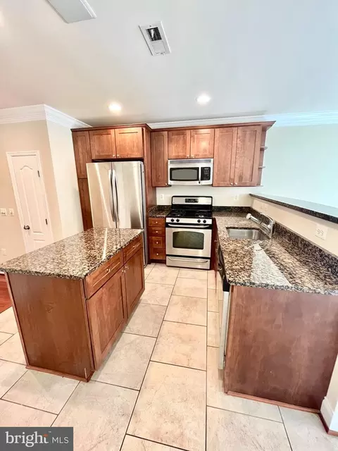 Kitchen - 219 S Regester St, Baltimore, MD 21231 photo 3 of 4