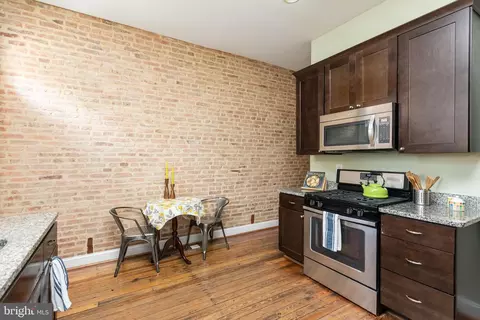 Kitchen - 237 E 25th St, Baltimore, MD 21218 photo 2 of 4