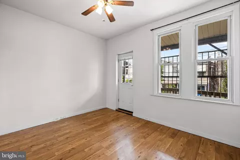 Living - 326 E 28th St, Baltimore, MD 21218 photo 2 of 2