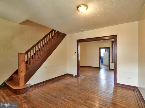 Living - 749 Bartlett Ave, Baltimore, MD 21218 photo 1 of 2