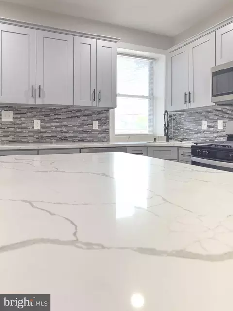 Kitchen - 1736 E 30th St, Baltimore, MD 21218 photo 7 of 8