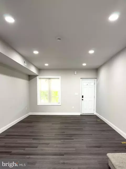 Living - 1736 E 30th St, Baltimore, MD 21218 photo 3 of 4