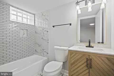 Bath - 1324 Kitmore Rd, Baltimore, MD 21239 photo 7 of 8