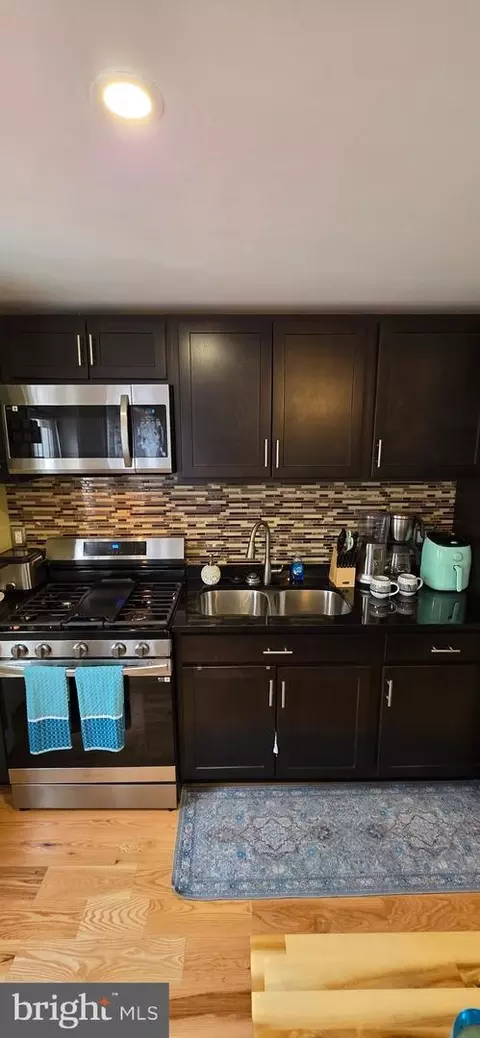 Kitchen - 2046 E Belvedere Ave, Baltimore, MD 21239 photo 2 of 3
