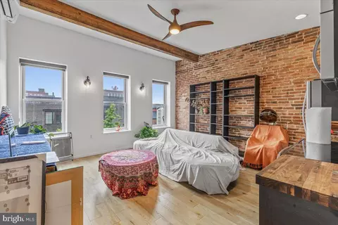 Living - 306 E Lanvale St, Baltimore, MD 21202 photo 1 of 1