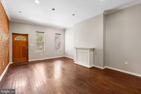 Living - 206 S Gilmor St, Baltimore, MD 21223 photo 4 of 5