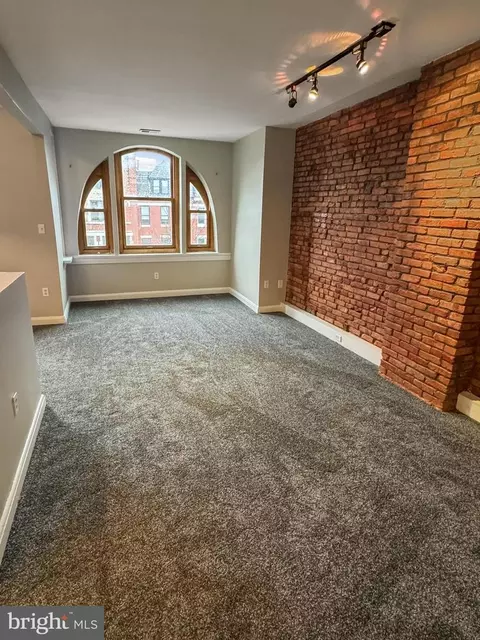 Living - 2224 Eutaw Pl, Baltimore, MD 21217 photo 4 of 5