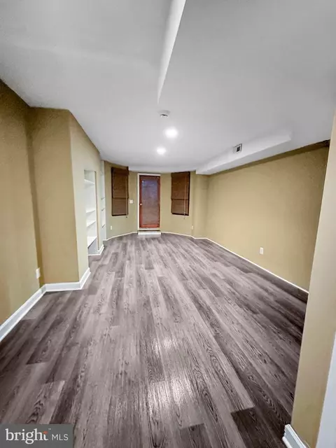 Living - 2224 Eutaw Pl, Baltimore, MD 21217 photo 3 of 5