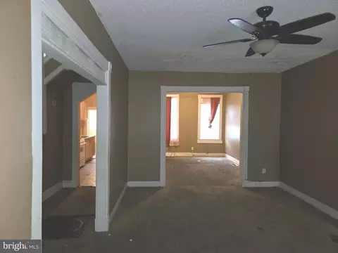 Living - 3806 W Garrison Ave, Baltimore, MD 21215 photo 2 of 3