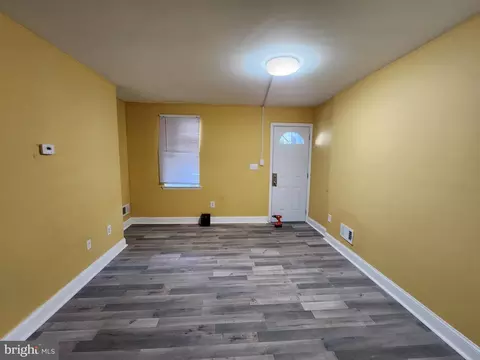 Living - 505 E 26th St, Baltimore, MD 21218 photo 1 of 3