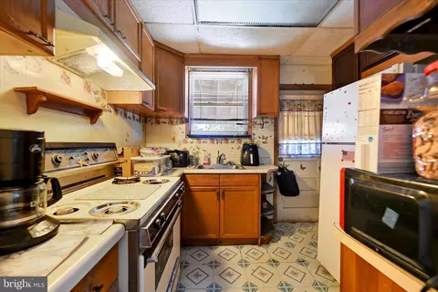 Kitchen - 729 E 37th St, Baltimore, MD 21218 photo 1 of 2