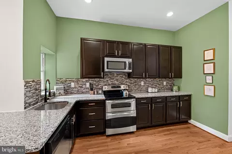 Kitchen - 325 E 22nd St, Baltimore, MD 21218 photo 2 of 3