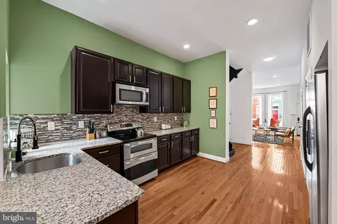 Kitchen - 325 E 22nd St, Baltimore, MD 21218 photo 1 of 3