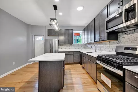 Kitchen - 327 E 24th St, Baltimore, MD 21218 photo 2 of 3