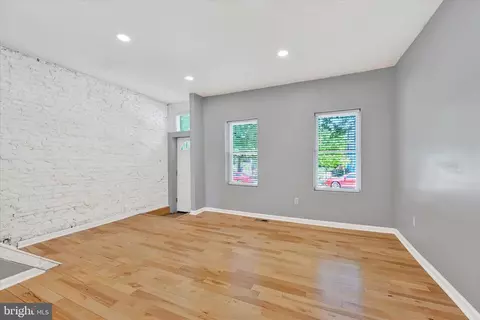 Living - 327 E 24th St, Baltimore, MD 21218 photo 2 of 5