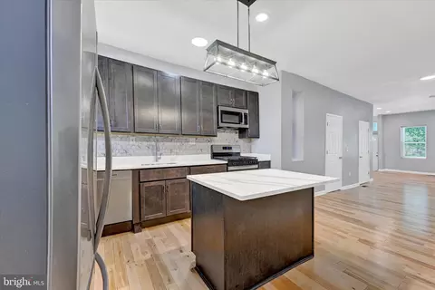 Kitchen - 327 E 24th St, Baltimore, MD 21218 photo 3 of 3