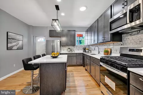 Kitchen - 327 E 24th St, Baltimore, MD 21218 photo 1 of 3