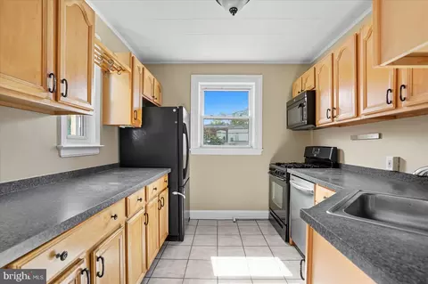 Kitchen - 913 E 37th St, Baltimore, MD 21218 photo 1 of 2