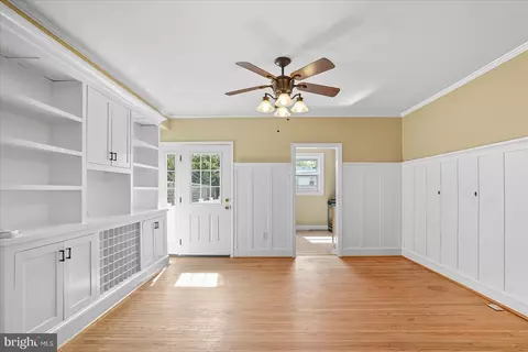 Living - 913 E 37th St, Baltimore, MD 21218 photo 5 of 6