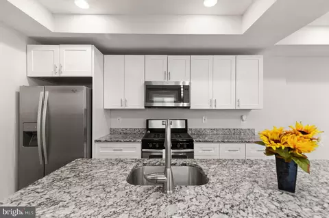 Kitchen - 3200 E Fairmount Ave, Baltimore, MD 21224 photo 2 of 2