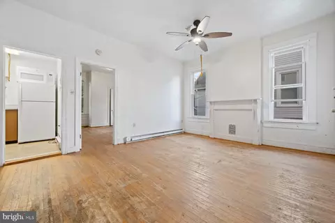 Living - 510 E 41st St, Baltimore, MD 21218 photo 9 of 10