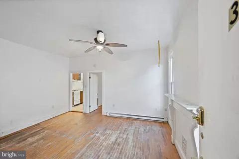 Living - 510 E 41st St, Baltimore, MD 21218 photo 8 of 10