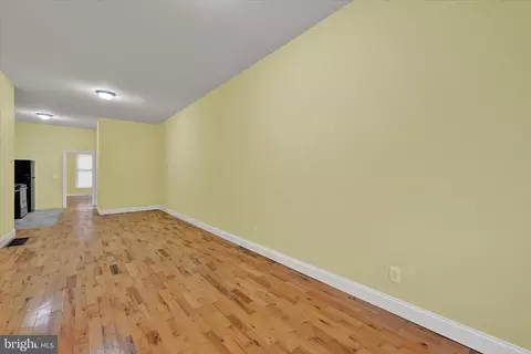 Living - 221 E Lafayette Ave, Baltimore, MD 21202 photo 1 of 7