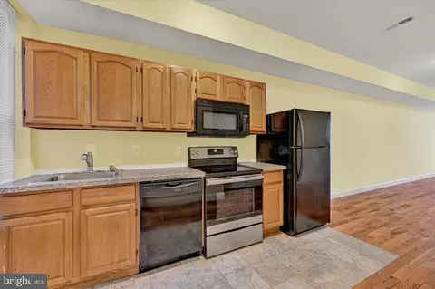 Kitchen - 221 E Lafayette Ave, Baltimore, MD 21202 photo 1 of 1