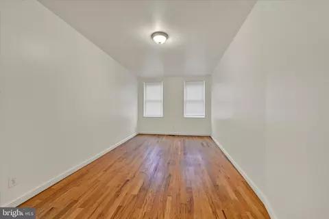 Living - 221 E Lafayette Ave, Baltimore, MD 21202 photo 6 of 7