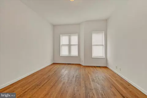 Living - 221 E Lafayette Ave, Baltimore, MD 21202 photo 5 of 7