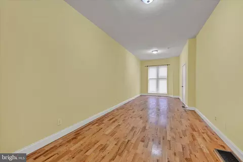 Living - 221 E Lafayette Ave, Baltimore, MD 21202 photo 2 of 7